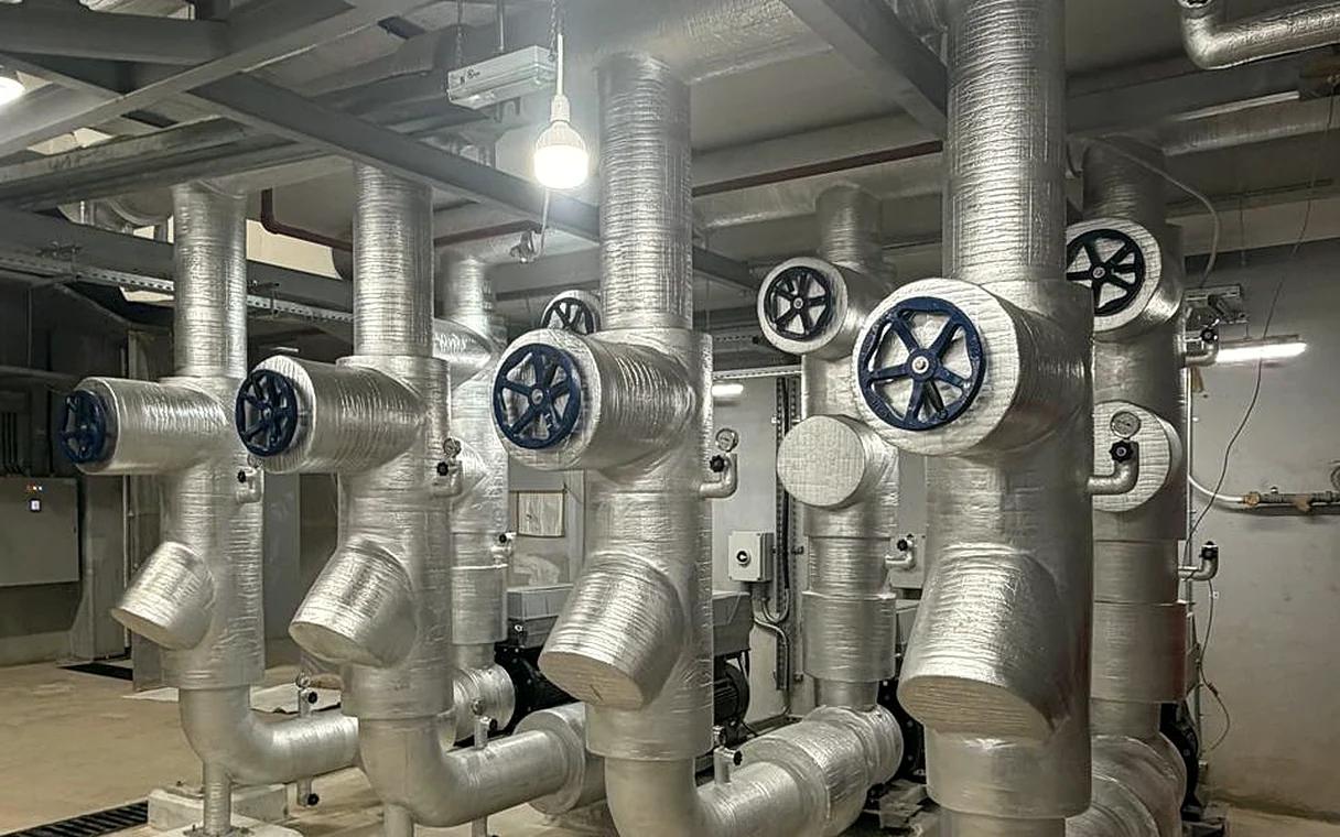 Chilled water plant room with insulated pipework and isolation valves installed by Mecamac in Oman